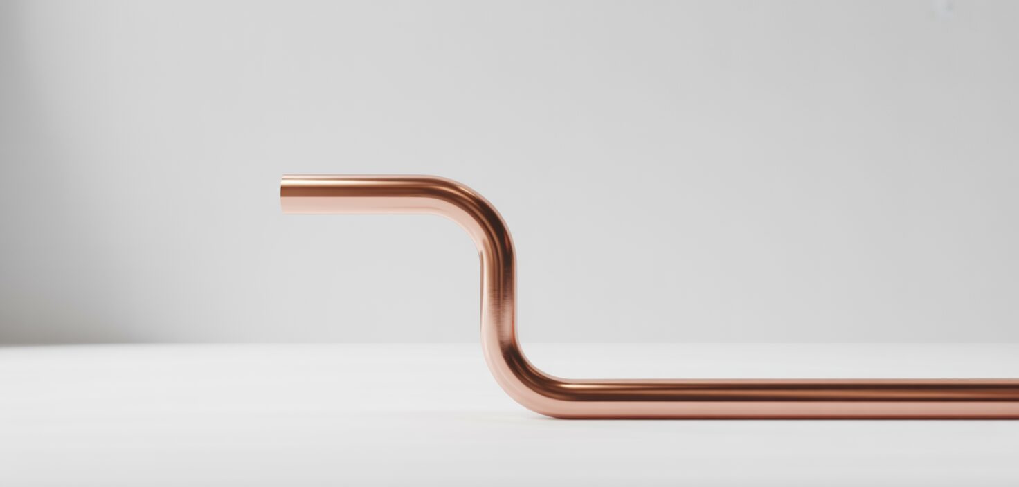 Fotorealistisk bild av kopparrör för VVS-arbete.